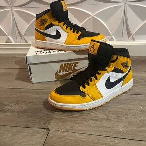 Nike Air Jordan Retro High in Black, Yellow, and White